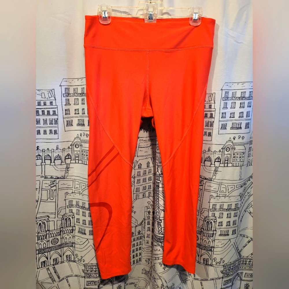 EUC Women's Orange Under Armour Leggings With Media Pocket